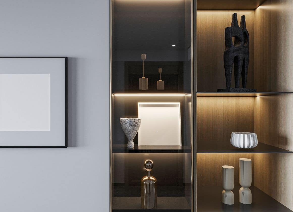 Meuble de rangement moderne équipé d’un éclairage LED intégré mettant en valeur les objets décoratifs et les niches de rangement.